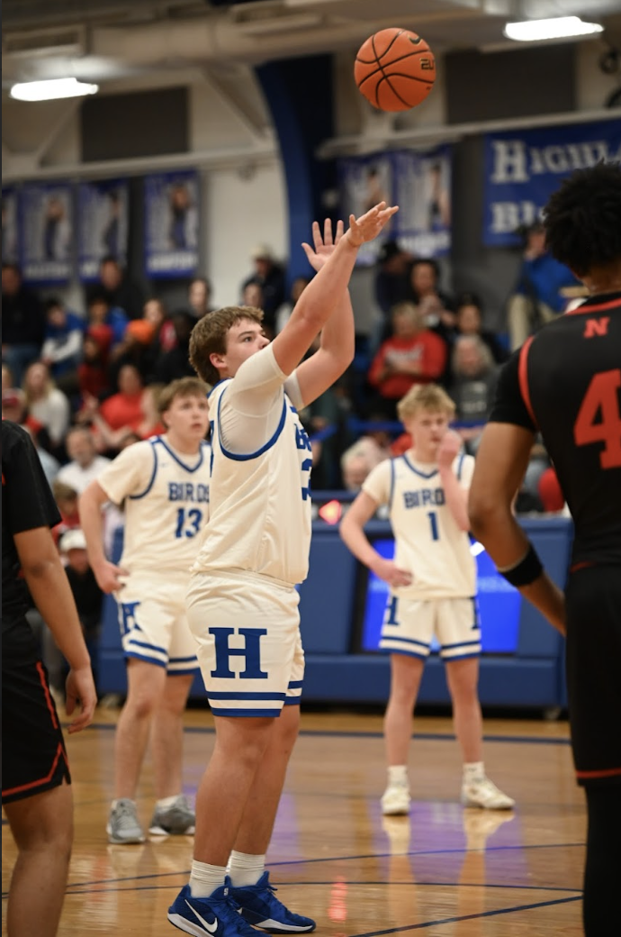 Taten Lorenzen (10) takes shot a free throw line. 